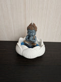Vela buda en flor de loto