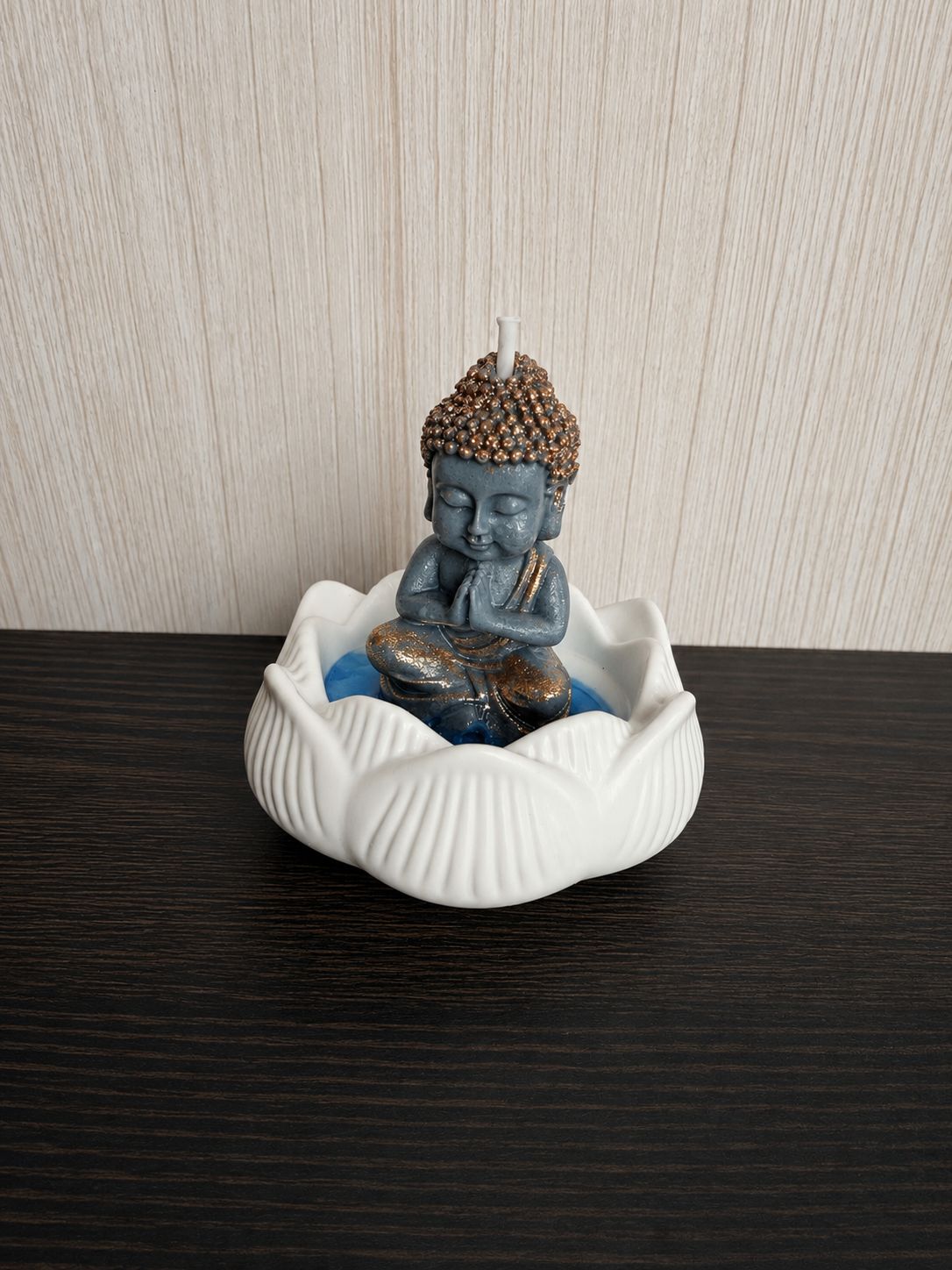 Vela buda en flor de loto
